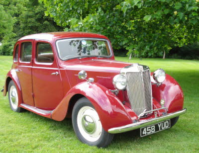 a red MG vintage car