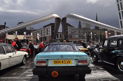 classic cars in the rain