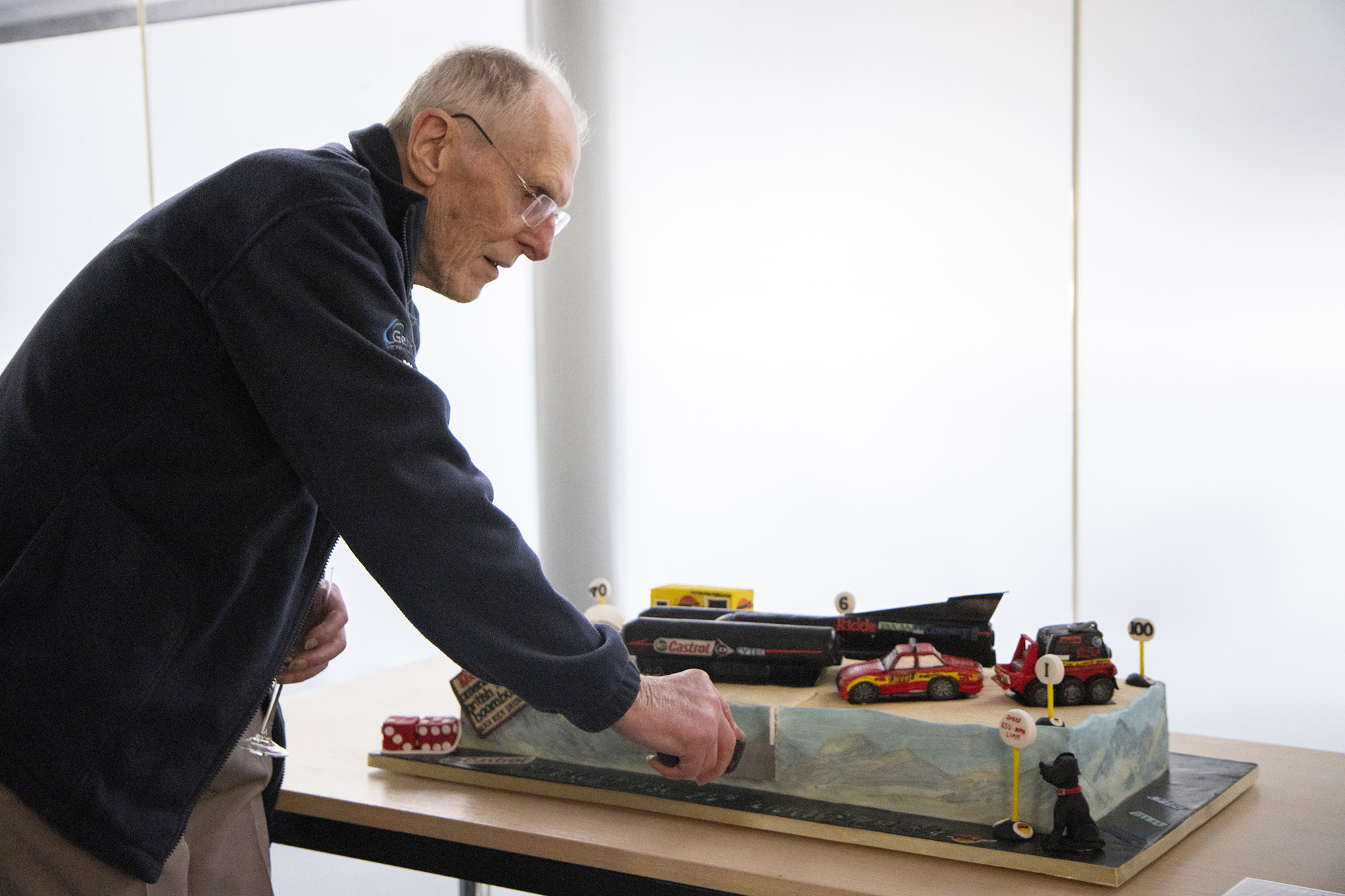 Ron Ayers cutting the Thrust anniversary cake pictured above