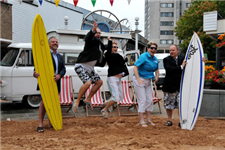 Staff Swap Suits  for Shorts and Surf Boards